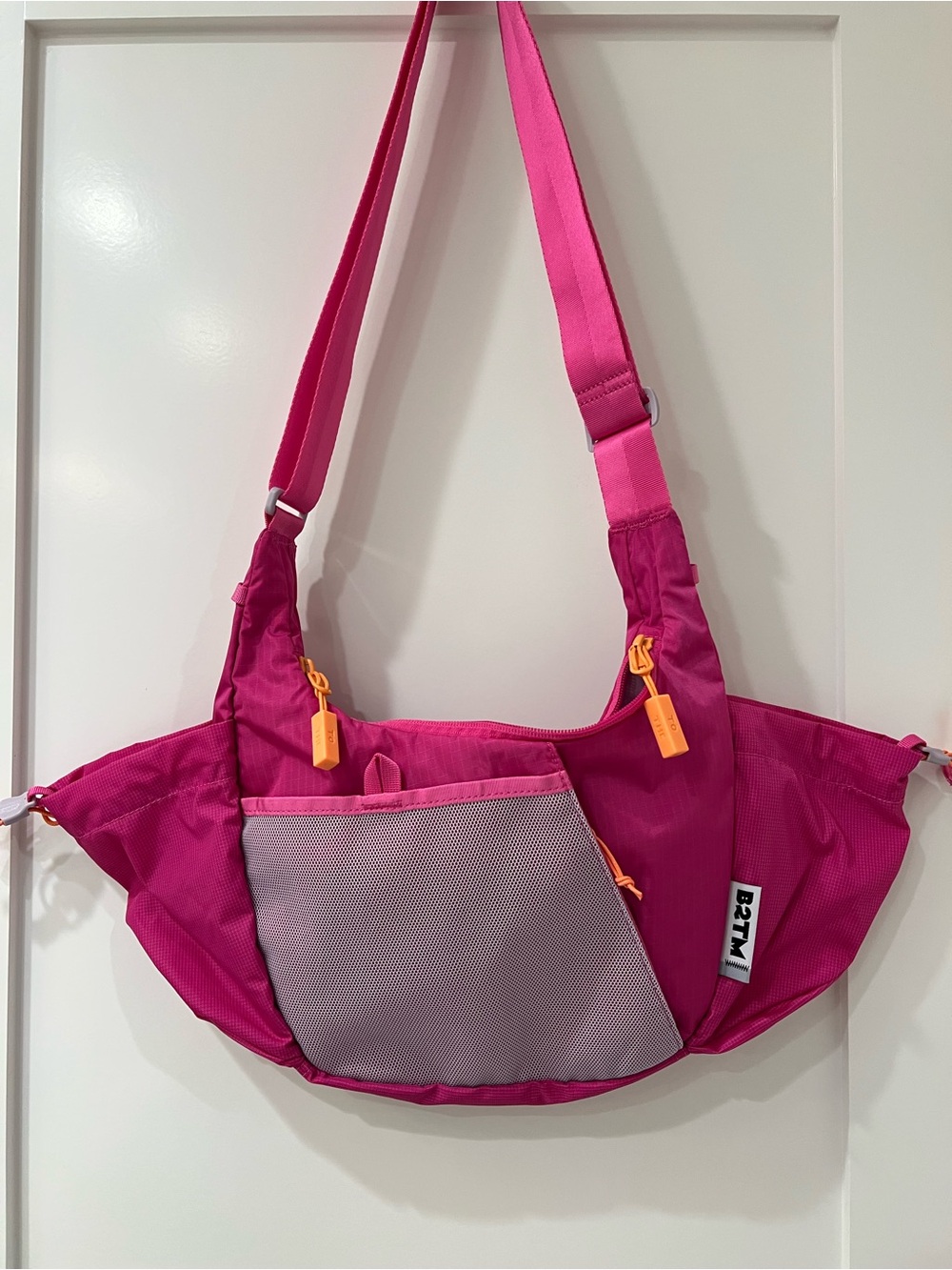 Baboon to the Moon 4.7L Pink crescent Shoulder Bag with Front Mesh Pocket